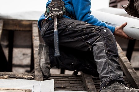 Strip and recover a roof